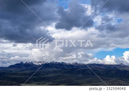 Snow-capped mountain under dark storm clouds in the Peruvian highlands Snow-capped mountain under dark storm clouds in the Peruvian highlands 132504048