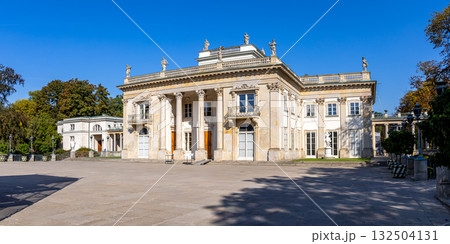 Lazienki Palace on island inside Lazienki Park panorama in Warsaw, Poland 132504131