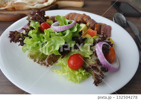 Cucumber salad in Chinese style. Salad with cucumbers and chili pepper. Asia salad with cucumber.	 132504278