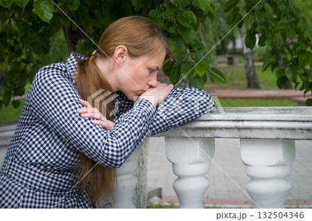 Sad girl in the park Sad girl in the park 132504346