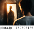 Mysterious silhouette reflected in a foggy mirror 132505176