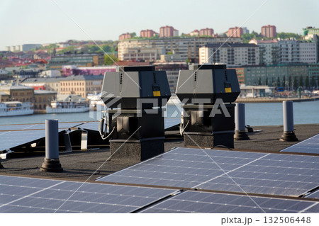 Solar panels on roof of apartment building, renewable green sustainable energy concept, water cooling, aerial view, Gothenburg, Sweden 132506448