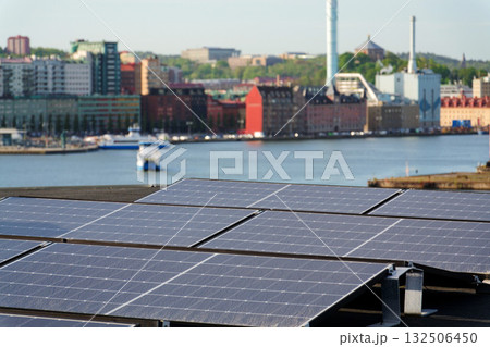 Solar panels on roof of apartment building, renewable green sustainable energy concept, water cooling, aerial view, Gothenburg, Sweden 132506450