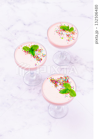 fruit mousse, made from jelly and cottage cheese, in glasses, decorated with sprinkles and mint, homemade fruit mousse, made from jelly and cottage cheese, in glasses, decorated with sprinkles and mint, homemade 132506480