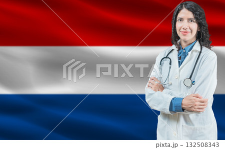 Dutch medicine and healthcare concept. Close up of doctor against Netherlands flag background 132508343