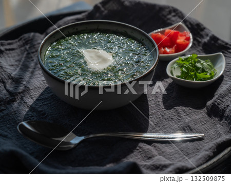 Traditional Russian lunch in a cafe. Top view of okroshka. Traditional Russian lunch in a cafe. Top view of okroshka. 132509875