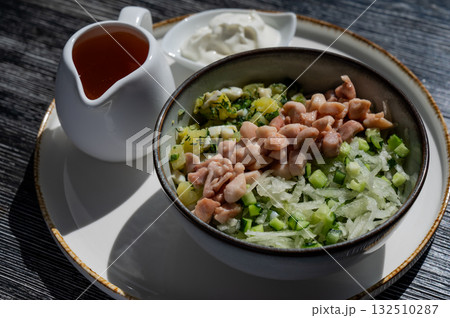 Okroshka with chicken on kvass in a cafe.  132510287