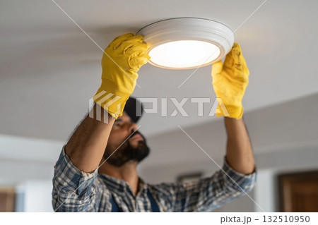 Professional electrician connecting electrical wires Professional electrician connecting electrical wires 132510950