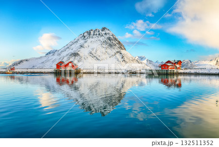 Astonishing morning view of small fishing village Ramberg at sunrise. Astonishing morning view of small fishing village Ramberg at sunrise. 132511352