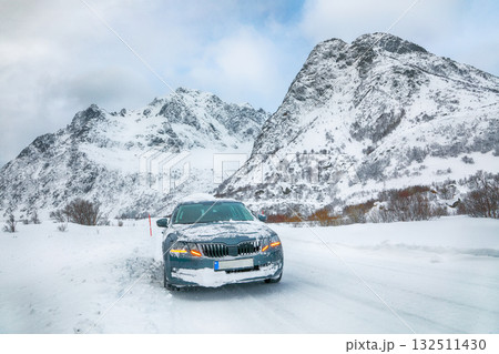 Amazing snowy winter scene of Vestvagoy island with snowy mountain peaks on Lofoten Islands . Amazing snowy winter scene of Vestvagoy island with snowy mountain peaks on Lofoten Islands . 132511430