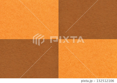 Texture craft orange and brown paper background with cells pattern. Vintage cardboard with copy space for banner Texture craft orange and brown paper background with cells pattern. Vintage cardboard with copy space for banner 132512106