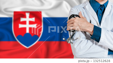 Doctor with stethoscope on Slovakia flag. Doctor holding stethoscope on Slovakia flag 132512628