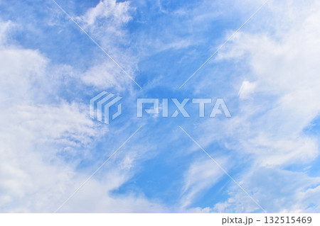 beautiful blue sky and white fluffy group of clouds with sunrise in the morning, natural background 132515469