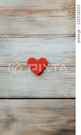 Red heart resting on rustic wooden background, symbolizing love and affection, perfect for valentine's day, mother's day, anniversaries, and romantic celebrations Red heart resting on rustic wooden background, symbolizing love and affection, perfect for valentine's day, mother's day, anniversaries, and romantic celebrations 132518223
