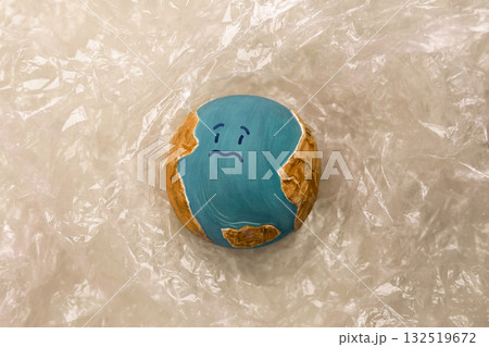 Sadness Globe wraped by Plastic materials. Environmental Issue Concept 132519672
