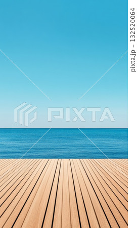 Wooden pier with parallel planks extends towards a calm blue ocean under a vast clear sky, creating a serene and idyllic setting, perfect for a summer escape or travel destination 132520064