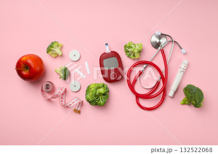 Medical gear and healthy foods on a pink backdrop 132522068