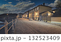 Porvoo, Finland - December 08, 2020: Cobblestone street scene at night, featuring illuminated buildings and a serene atmosphere, reflecting calmness and urban charm 132523409