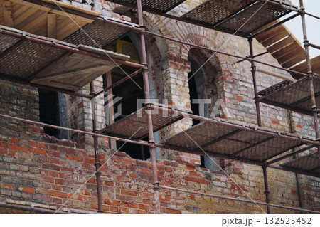 Restoration of an old brick building 132525452