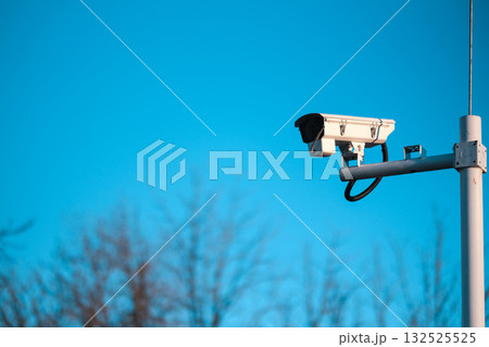 CCTV Camera on Blue Sky Background CCTV Camera on Blue Sky Background 132525525