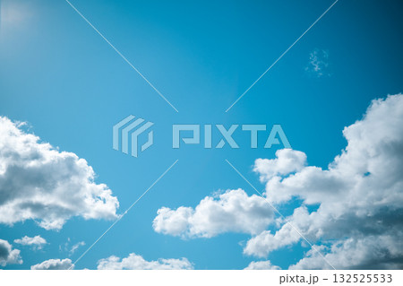 Clouds in the blue sky as a background Clouds in the blue sky as a background 132525533