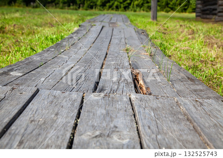 Old Wooden Plank Walkway in Village, Close-Up 132525743