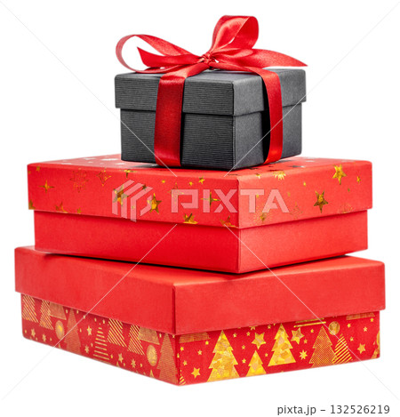 Stack of red and black gift boxes decorated with gold Christmas patterns and red ribbon, isolated on white background. Holiday composition symbolizing celebration, surprise, and festive spirit Stack of red and black gift boxes decorated with gold Christmas patterns and red ribbon, isolated on white background. Holiday composition symbolizing celebration, surprise, and festive spirit 132526219