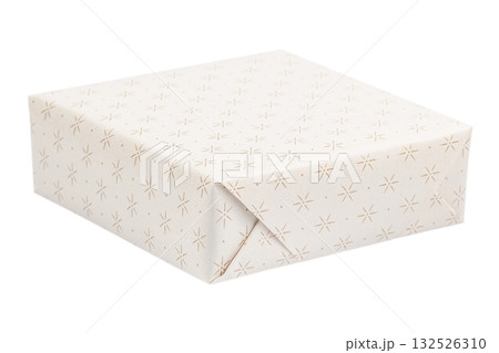 Minimalist beige gift box wrapped in elegant paper with golden star pattern, isolated on white background, symbolizing sophistication, holiday elegance, and modern design Minimalist beige gift box wrapped in elegant paper with golden star pattern, isolated on white background, symbolizing sophistication, holiday elegance, and modern design 132526310