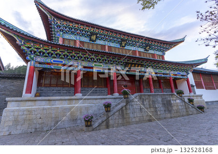Lijiang, China - April 10, 2024 : Beautiful image of Mufu Palace in Lijiang old town at evening light in Lijiang, China on April 10, 2024. Lijiang, China - April 10, 2024 : Beautiful image of Mufu Palace in Lijiang old town at evening light in Lijiang, China on April 10, 2024. 132528168