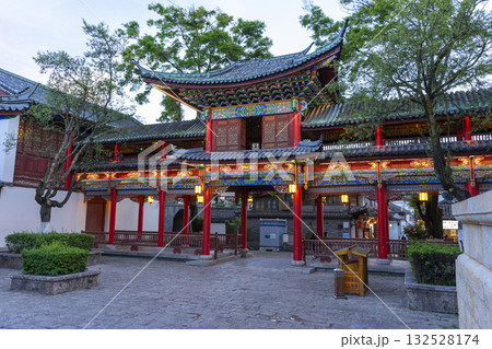 Lijiang, China - April 10, 2024 : Beautiful image of Mufu Palace in Lijiang old town at evening light in Lijiang, China on April 10, 2024. Lijiang, China - April 10, 2024 : Beautiful image of Mufu Palace in Lijiang old town at evening light in Lijiang, China on April 10, 2024. 132528174