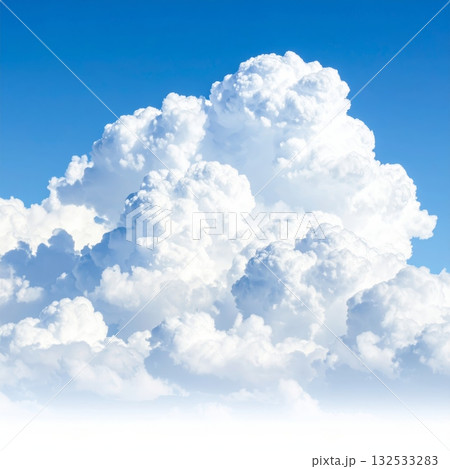 Fluffy white clouds float in the clear blue sky on a beautiful day. 132533283