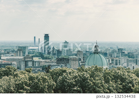 Vintage toned panorama of Brescia from castle hill highlighting New Cathedral dome and skyline 132534438