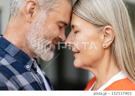 Waist up picture of man and woman face to face to each other feeling peaceful Waist up picture of man and woman face to face to each other feeling peaceful 132537903