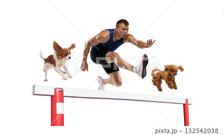 Sprinter hurdling beside two dogs in surreal synchronized motion collage on white background 132542038