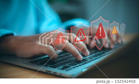 Cybersecurity Alert and Data Protection Warning on Laptop Computer Cybersecurity Alert and Data Protection Warning on Laptop Computer 132542458
