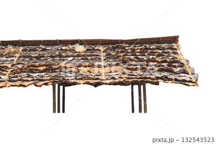 Thatched roof made of overlapping dried leaves with clipping path Thatched roof made of overlapping dried leaves with clipping path 132543523