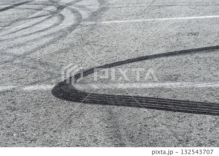 Asphalt with drift traces of tires 132543707