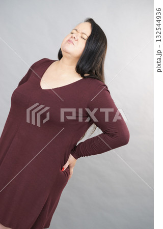 Woman having loins pain ache 132544936