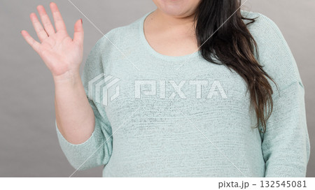 Plus size mature woman in jumper Plus size mature woman in jumper 132545081