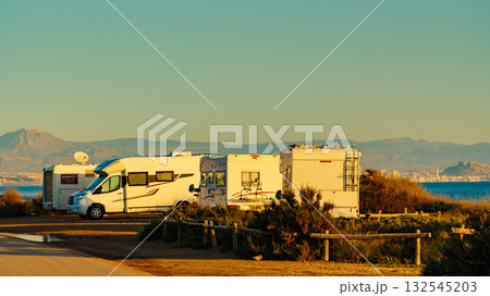Camper cars on beach sea shore Camper cars on beach sea shore 132545203