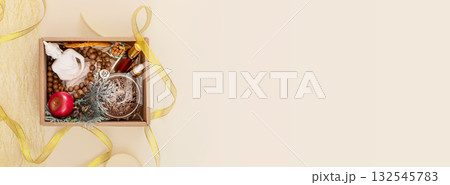 Holiday banner with Christmas kit for meditation and relaxation. Gift box with buddha statue, aroma sticks, natural oils, decorations and golden ribbon. Preparing surprise for Christmas and New Year 132545783