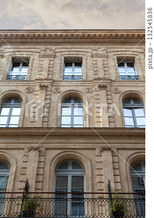 Stoned facade of a stylish building 132545836