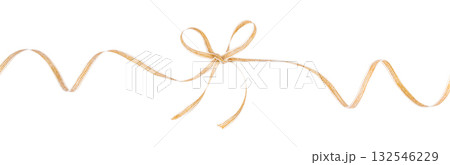 Golden decorative ribbon tied in a bow isolated on white background for festive gift wrapping and holiday design Golden decorative ribbon tied in a bow isolated on white background for festive gift wrapping and holiday design 132546229