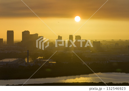 View from above of contemporary high skyscraper buildings in downtown district of Tampa city in Florida, USA at sunset. American megapolis with business financial district 132546923