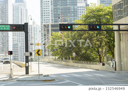 Traffic lights regulating driving cars on city street in Miami, Florida 132546949