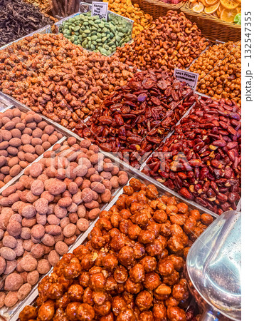 Colorful Variety of Candied Nuts and Dried Fruits at Market Stall 132547355