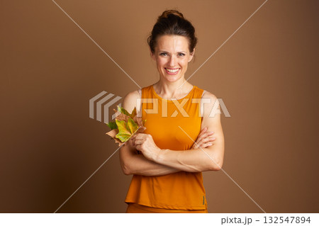 Serene Autumn Joy with Crossed Arms 132547894