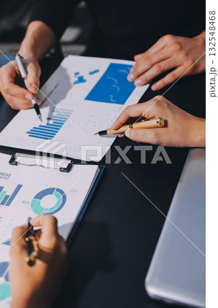 Accounting company provide finance and taxation planning for profitable cash flow, Auditor and accountant team working in office, analyze financial data and accounting record with calculator.Insight 132548468