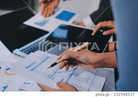 Accounting company provide finance and taxation planning for profitable cash flow, Auditor and accountant team working in office, analyze financial data and accounting record with calculator.Insight 132548517