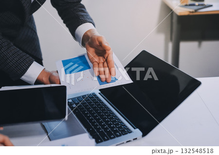 Accounting company provide finance and taxation planning for profitable cash flow, Auditor and accountant team working in office, analyze financial data and accounting record with calculator.Insight 132548518